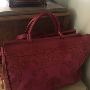 Red, hand tooled, Italian genuine leather bag.